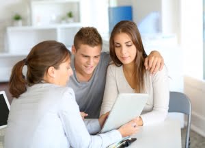 Young couple meeting financial consultant for credit loan