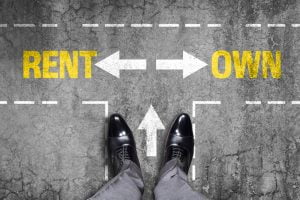Low section view of a man standing by text Rent and Own with arrow sign represents the concept of home ownership.